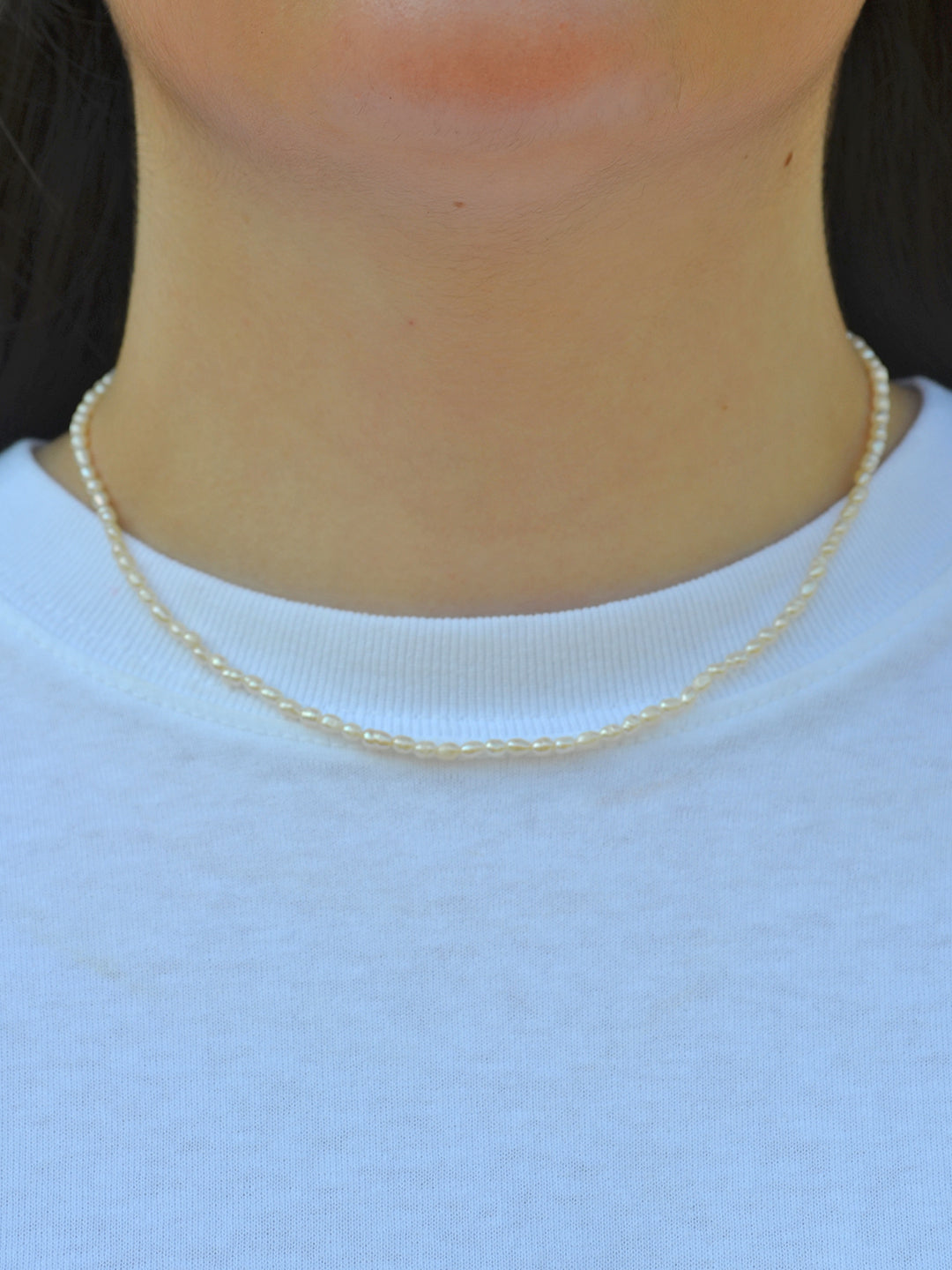 Worn as a classic everyday piece, this freshwater pearl necklace adds a subtle and timeless touch to any look.