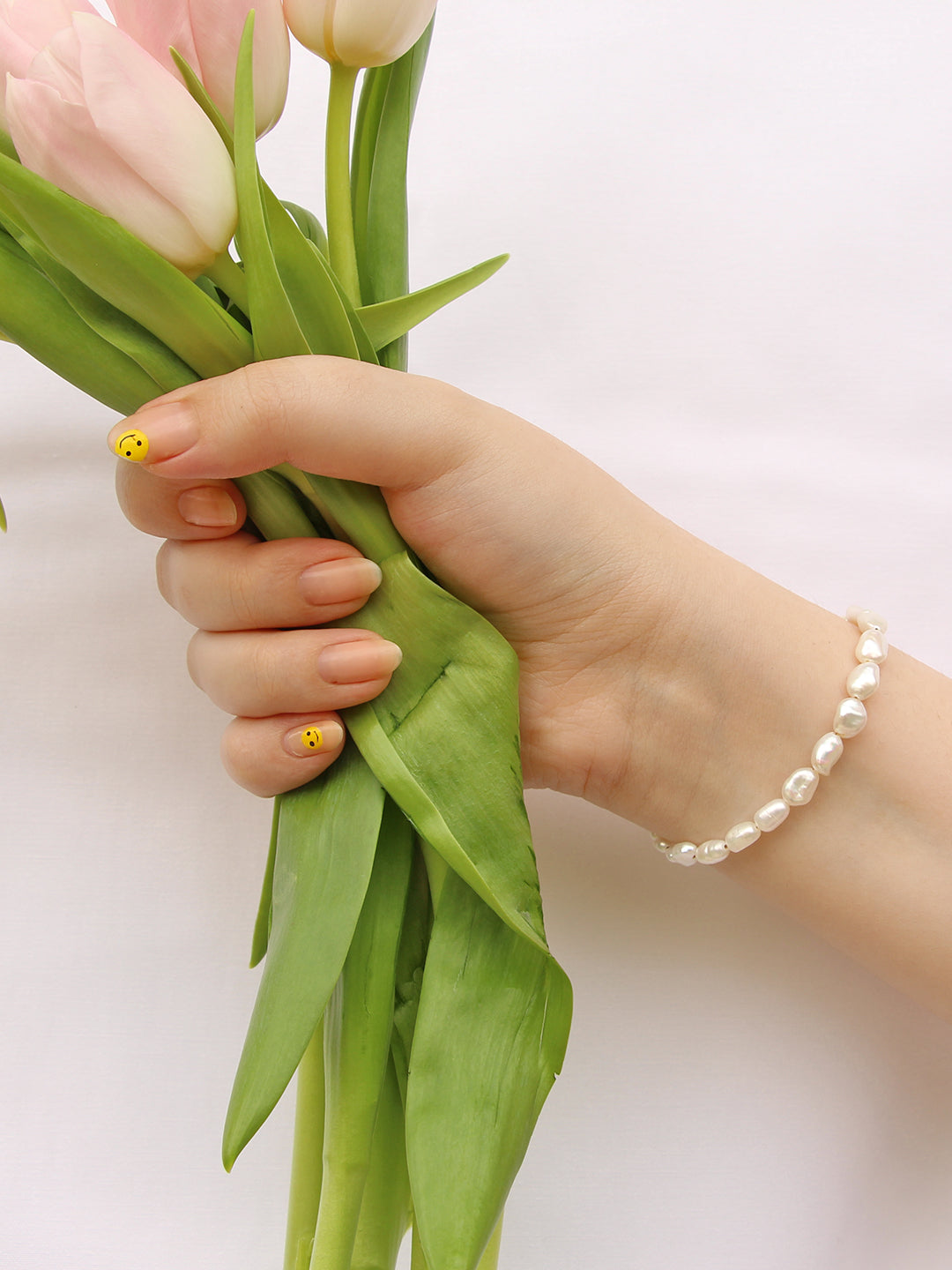 Dionne's Bracelet: Keshi freshwater pearl bracelet in ascending sizes: Larger pearls at the front of the bracelet and smaller towards the end. Symmetrical design.